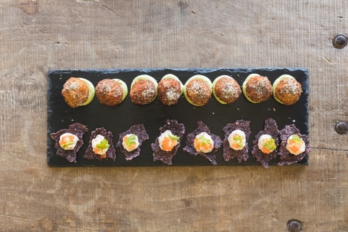 Gourmet Canapé Platter on Rustic Table - Australian Stock Image