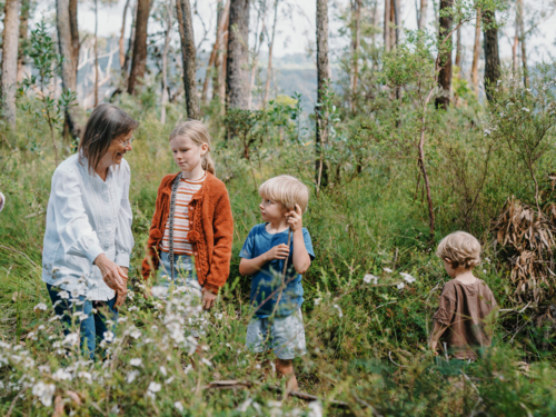 Grandparent enjoying Australian Bushland with her Grandchildren - Australian Stock Image