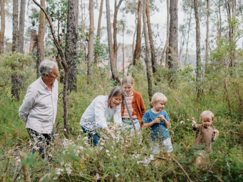 Grandparents enjoying Australian Bushland with their Grandchildren - Australian Stock Image