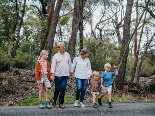Grandparents enjoying Australian Bushland with their Grandchildren - Australian Stock Image