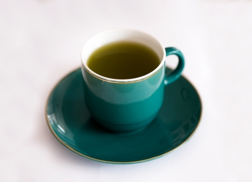 Green tea in a green tea cup - Australian Stock Image