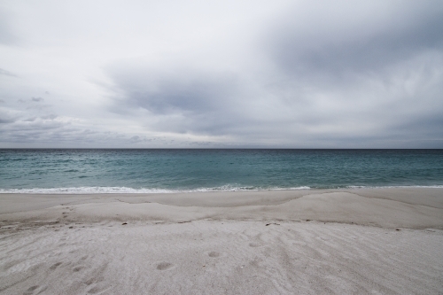 Grey moody sky at the beach - Australian Stock Image