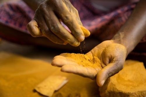 Grinding ochre - Australian Stock Image