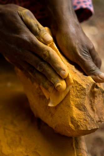 Grinding ochre - Australian Stock Image