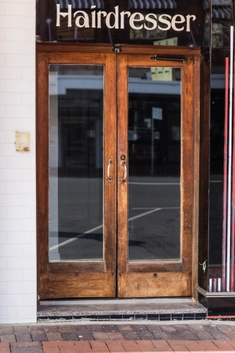 Hairdresser business with wooden doors - Australian Stock Image