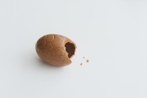 Half eaten hollow chocolate easter egg - Australian Stock Image