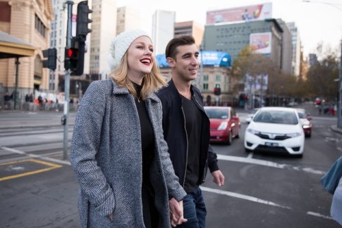 Happy Couple Exploring Melbourne on Foot - Australian Stock Image