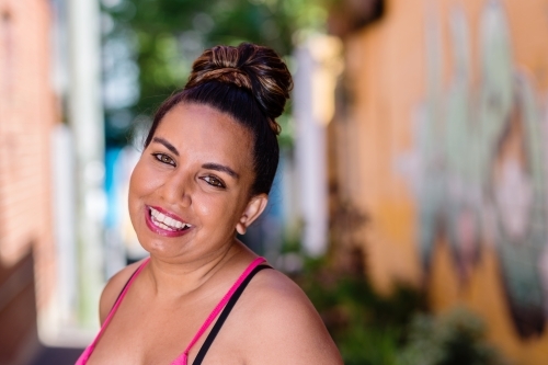 happy smiling young aboriginal woman