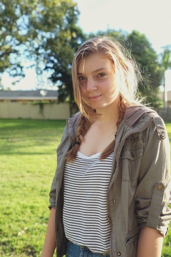 Happy teenage girl in the park