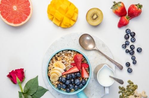 Healthy breakfast with wholegrain cereal and fruit - Australian Stock Image