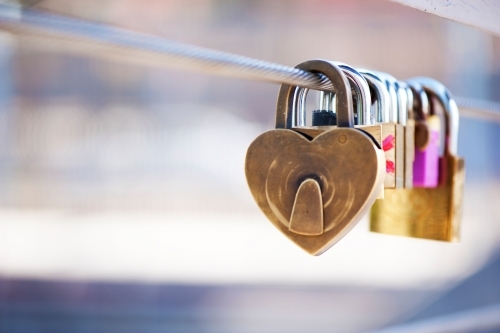 Heart Padlock on a metal railing. - Australian Stock Image
