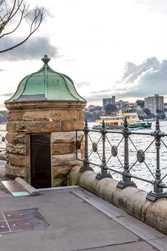 Heritage sandstone observatory Sydney Harbour with Ferry in background - Australian Stock Image