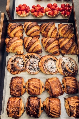 High angle shot of open draw full of fresh baked pastries - Australian Stock Image