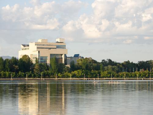 High Court of Australia reflected in Lake Burley Griffin - Australian Stock Image