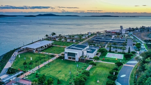 Horizontal shot of a resort town at sunset - Australian Stock Image