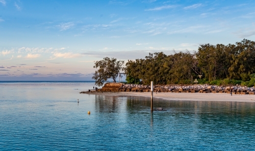 Horizontal shot of an island at sunset - Australian Stock Image
