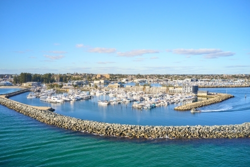 horizontal shot of Fremantle's Challenger Harbour on a sunny day with boats, yachts and groyne - Australian Stock Image