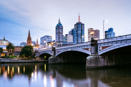Horizontal shot of Princes Bridge and city buildings on the Yarra River - Australian Stock Image