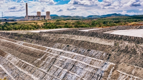 Horizontal shot of Stanwell power station and ash piles - Australian Stock Image