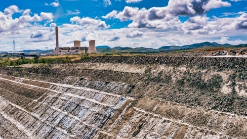 Horizontal shot of Stanwell power station and ash piles - Australian Stock Image