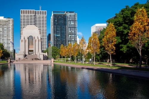 Hyde Park with ANZAC Memorial on a bright sunny day in autumn - Australian Stock Image