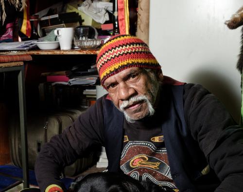 Indigenous Australian Man wearing colourful beanie - Australian Stock Image