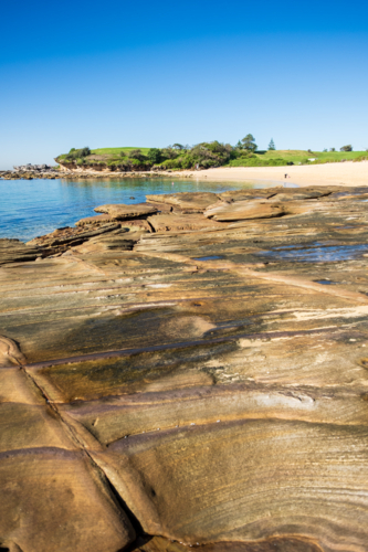 interesting rock formation at Little Bay beach - Australian Stock Image