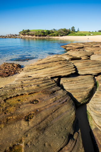 interesting rock formation at Little Bay beach - Australian Stock Image