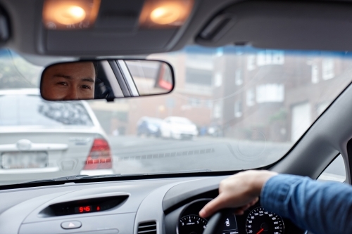 Interior of man driving car - Australian Stock Image