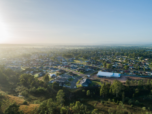 intersection of bush and development of town with dead end of road - Australian Stock Image