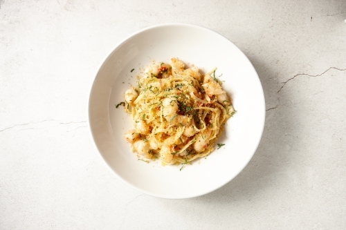 Italian gourmet prawn pasta in bowl - Australian Stock Image