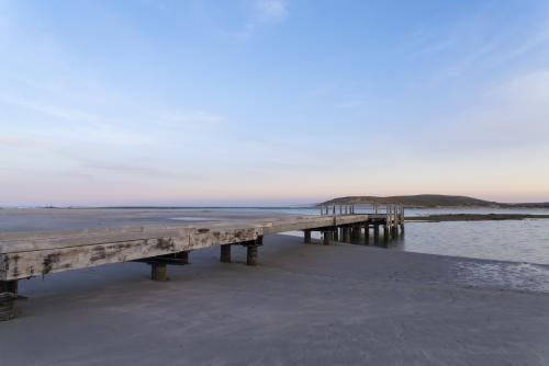 Jetty over River Mouth - Australian Stock Image