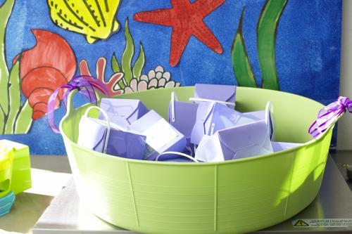 Kids party packs in a green bowl