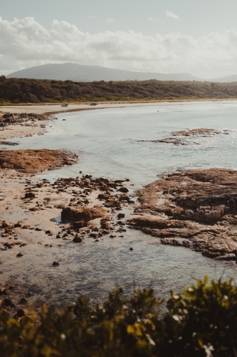 Landscape of the rocky coast and clear water at Diamond Head Beach, NSW. - Australian Stock Image