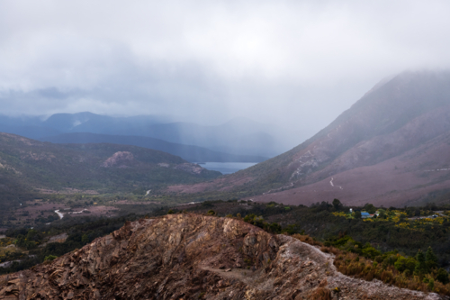 Landscape view of an old open cut mine on a cloudy day, Tasmania - Australian Stock Image