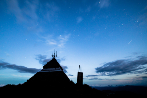 Landscape views of starry dusk sky from summit of Mt Buller over the Victorian Alps in High country - Australian Stock Image
