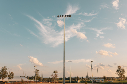 light tower with blue sky background - Australian Stock Image