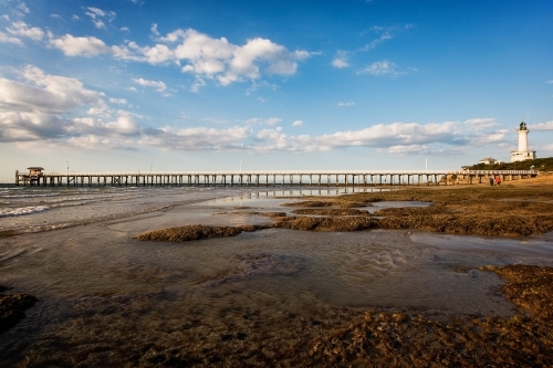 Lighthouse and long jetty with shed - Australian Stock Image