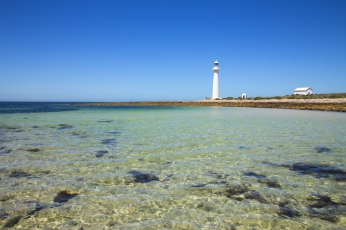 Lighthouse on a bay with blue sky - Australian Stock Image