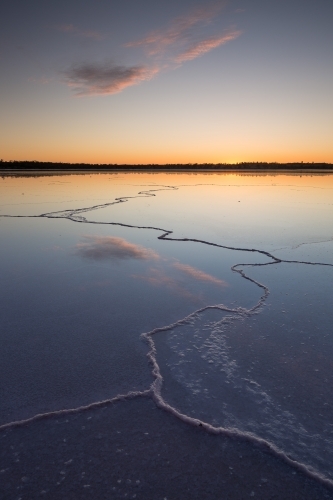 Lines on a salt lake with colourful dawn sky - Australian Stock Image