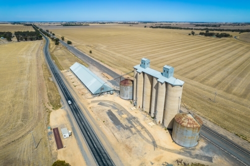 Looking down at silos, grain storage and railway line in the Mallee - Australian Stock Image