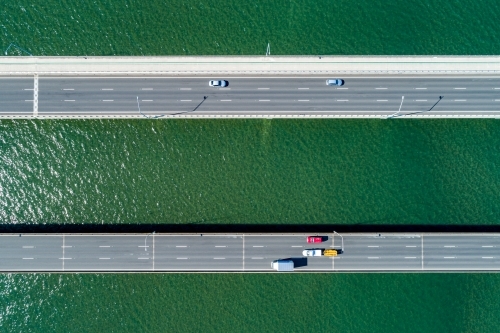 Looking down on traffic on two bridges. - Australian Stock Image