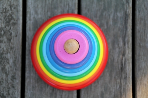 Looking down onto a stack of coloured rings - Australian Stock Image