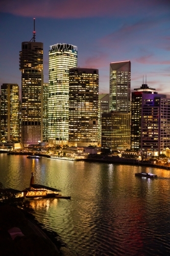 Looking over Brisbane River and the city from the Story Bridge at twilight. - Australian Stock Image