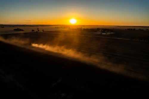 Low sunset over agricultural fields - Australian Stock Image