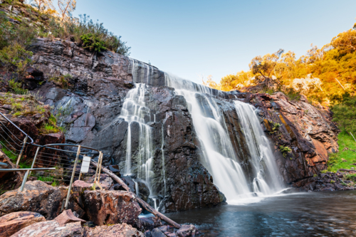 MacKenzie Falls of the River Gorge waterfall cascading down the cliffs in Grampians - Australian Stock Image