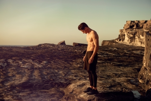 Male exercise morning run ocean - Australian Stock Image