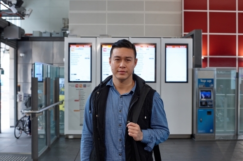 Man at train station - Australian Stock Image