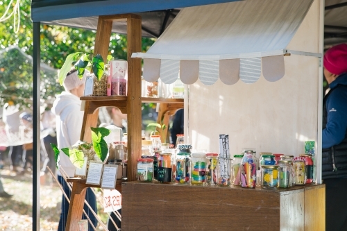 Market stall with objects in jars - Australian Stock Image