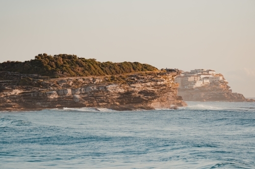 Marks Park headland at sunrise as seen from Bronte Beach - Australian Stock Image